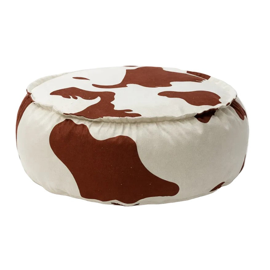 Ronde kinderpoef uit de Cow Collection met zwart-witte koeienprint en zachte stoffen bekleding