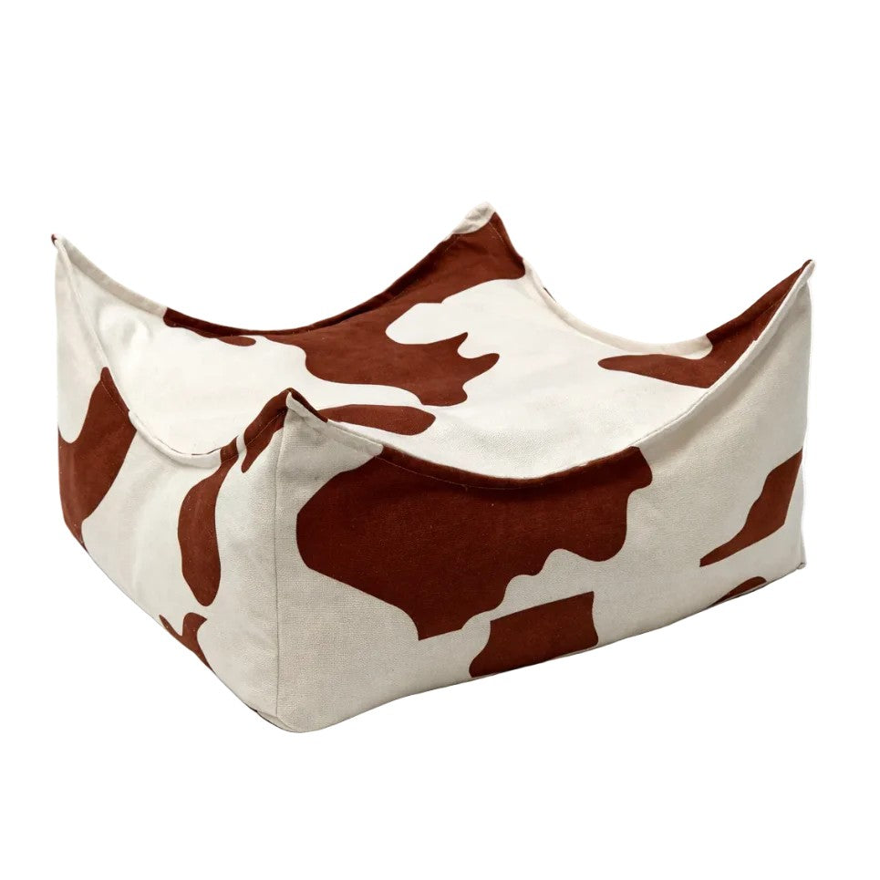 Vierkante kinderpoef uit de Cow Collection met zwart-witte koeienprint en zachte stoffen bekleding