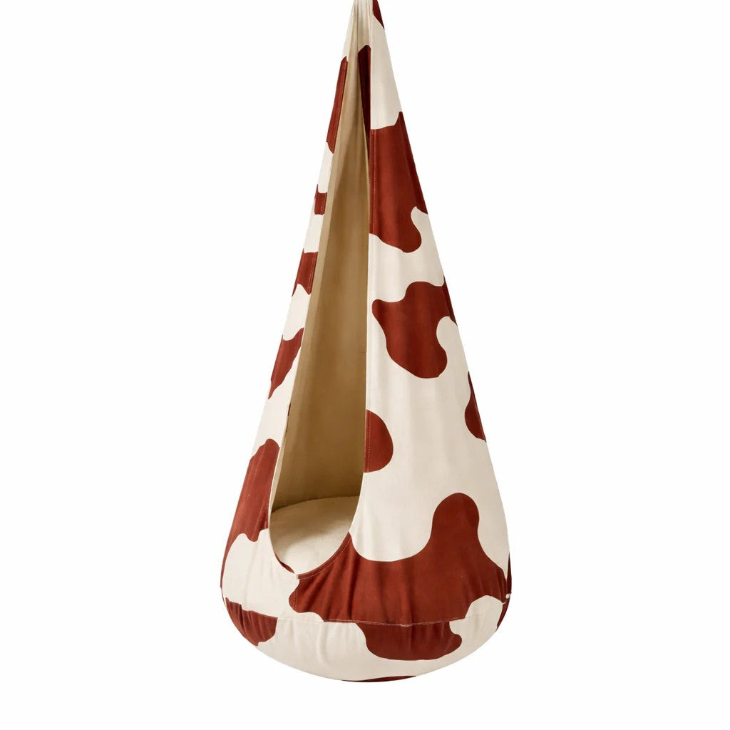 Bees & Blooms Cocoon Swing kinder hangstoel in Cow-uitvoering met rond zitkussen