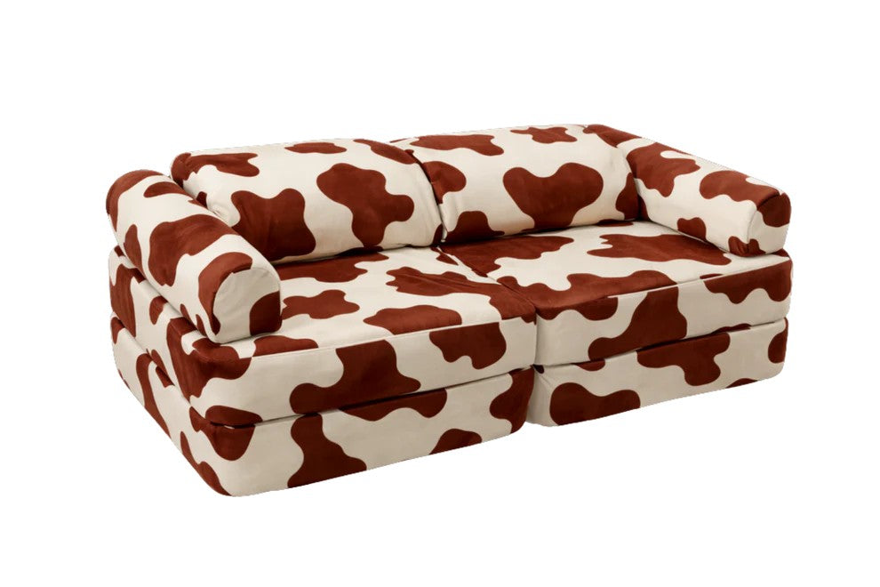 Bees & Blooms modulaire speelsofa met koeienprint uit de Cow Collection voor bouwen, spelen en ontspannen in de kinderkamer